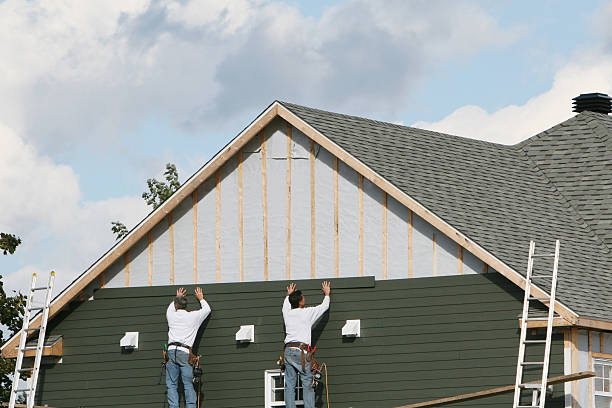 Professional Siding Contractor technician working in Freeland, PA